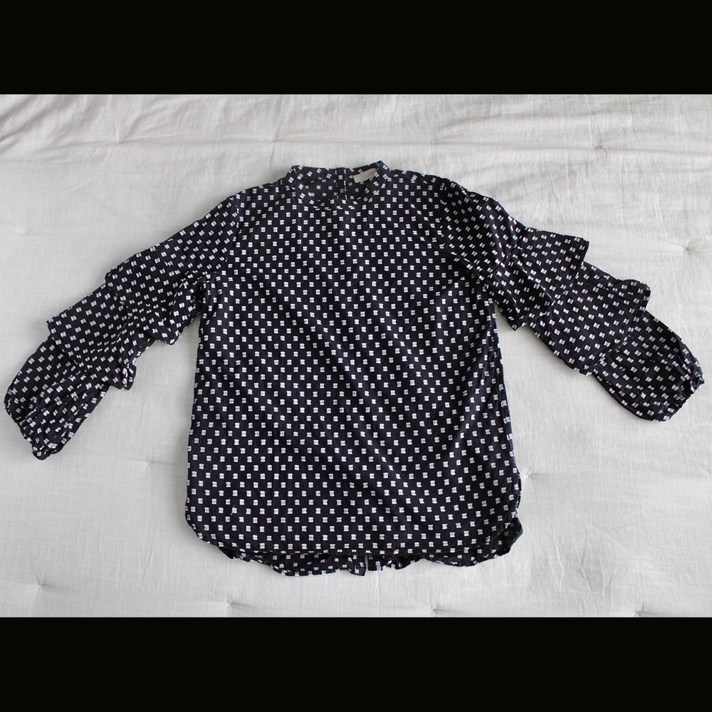 Black and white statement sleeve blouse
